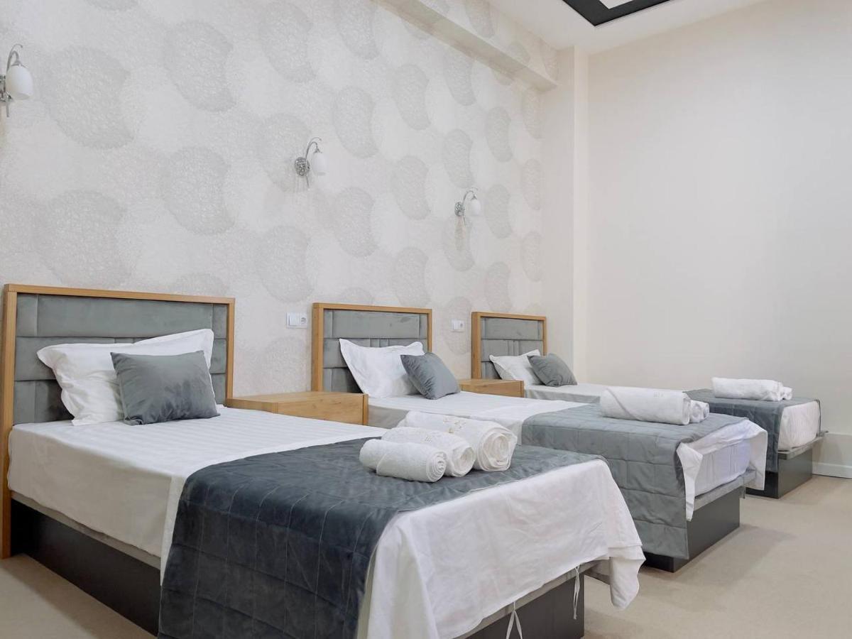 Emin Hotel Фергана Экстерьер фото